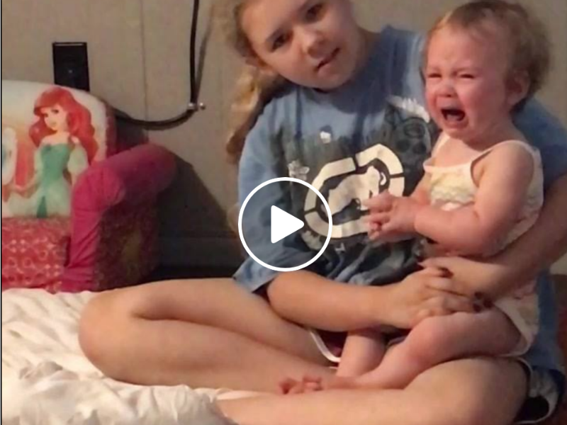 crying little girls reaction to sister