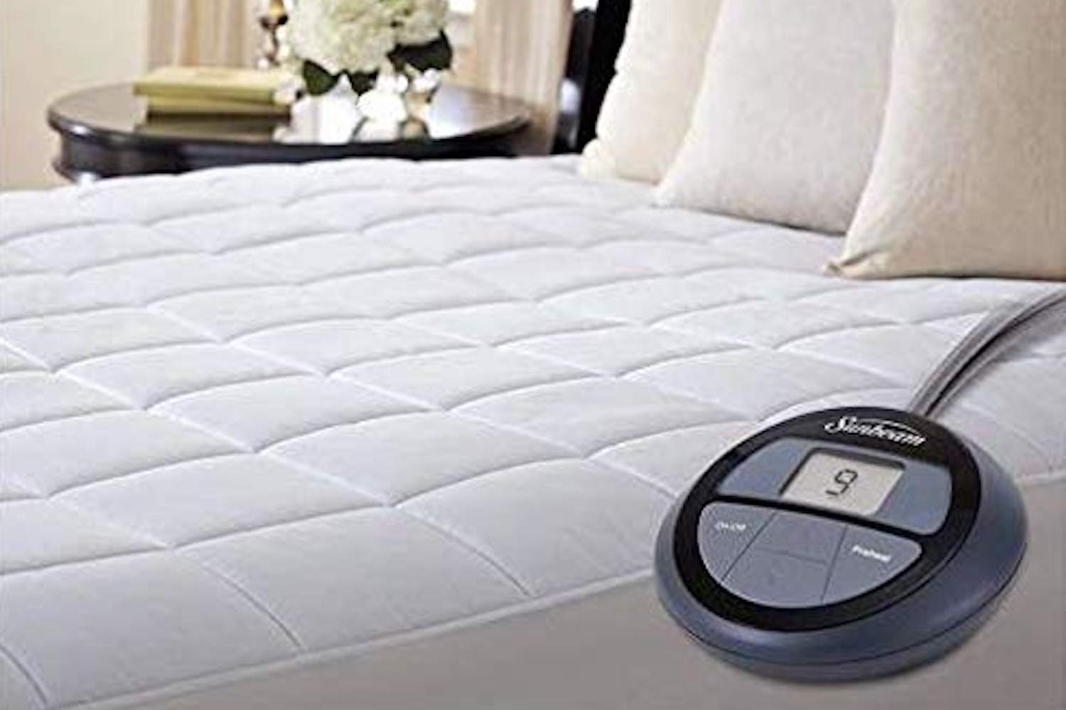 heated mattress pad on synthetic mattress topper