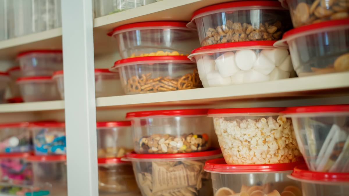 7 Tricks for Taming Your Cabinet of Food Storage Containers  Kitchen hacks  organization, Home organization, Tupperware organizing