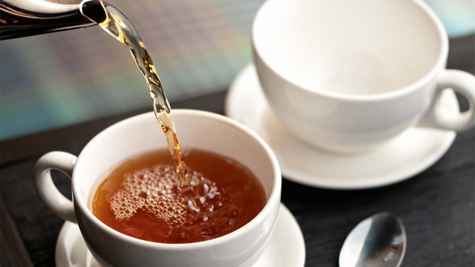 Black tea being poured