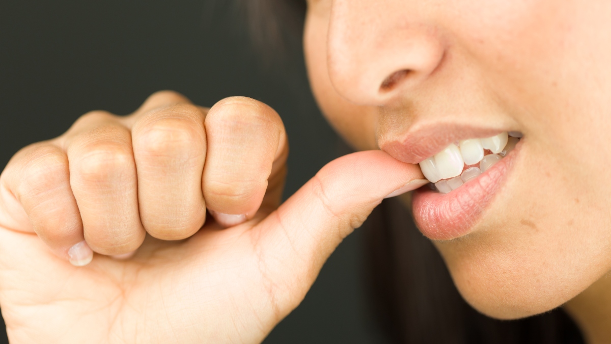 The Dental Dangers of Teeth Grinding and Nail Biting | Dentevim Dental  Clinic