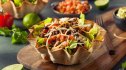 Homemade tortilla bowls with taco salad inside