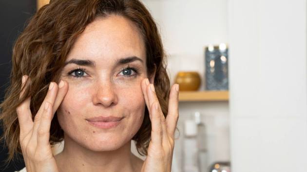Woman focusing on clean beauty for her skin