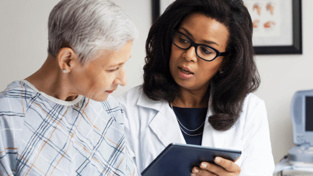 Older woman talking with her doctor