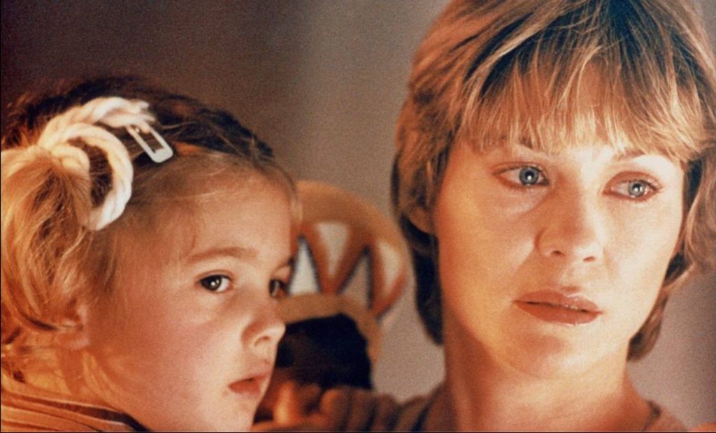 woman holding child; dee wallace