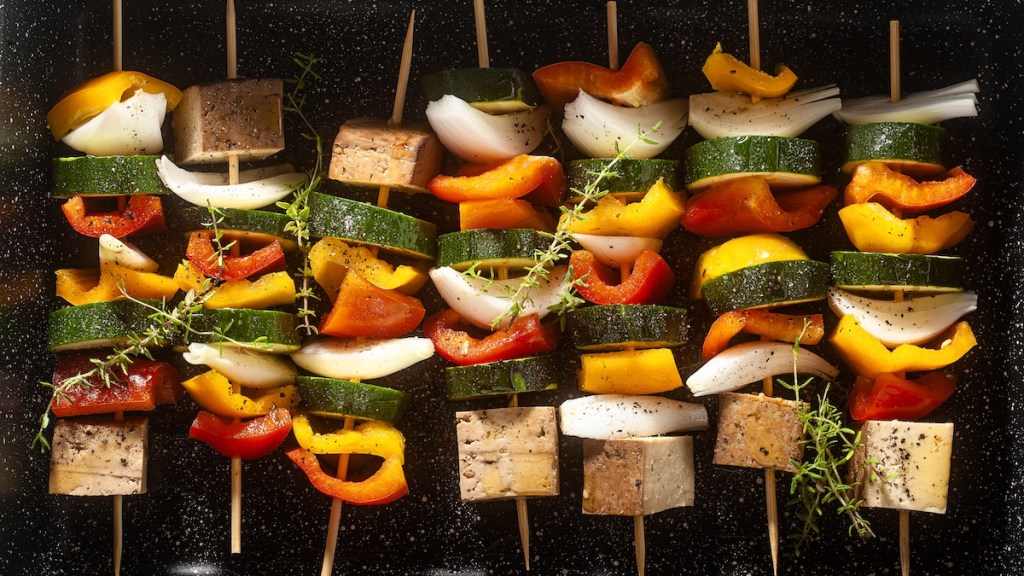 Veggie skewers on a grill