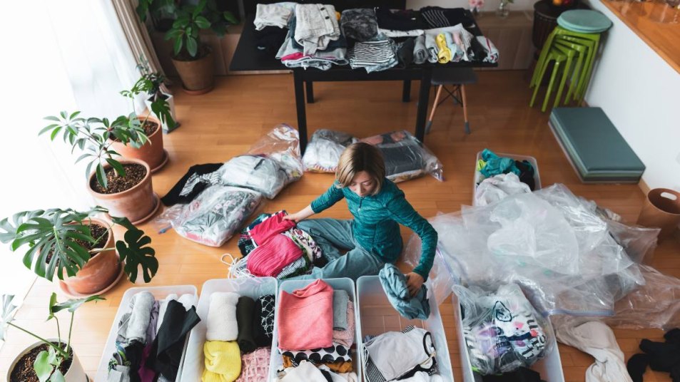 Woman decluttering home for summer