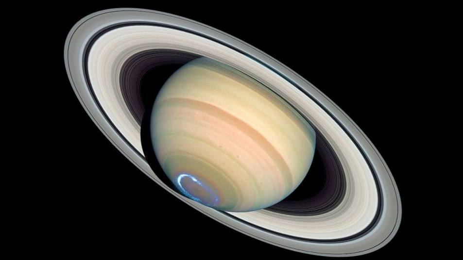 Aurora lights in the pole. Saturn experiences this phenomenon just like Planet Earth. Digital improvement of an image from NASA. Media usage guidelines