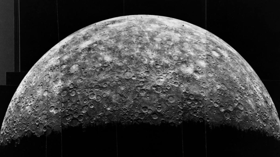 A half disk view of the planet Mercury, taken by the Mariner 10 space probe, 1974. South is to the left. | Location: Mercury.