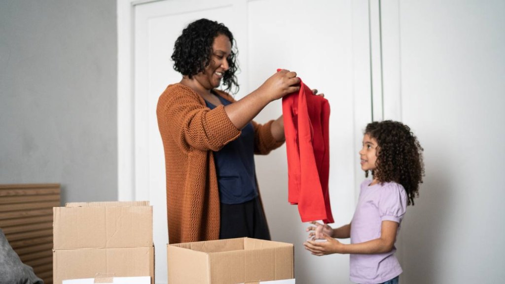 Mom and daughter decluttering for summer