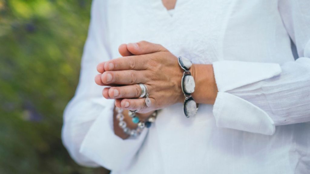 mature woman's hands wearing heavy jewelry which can lead to bruising easily