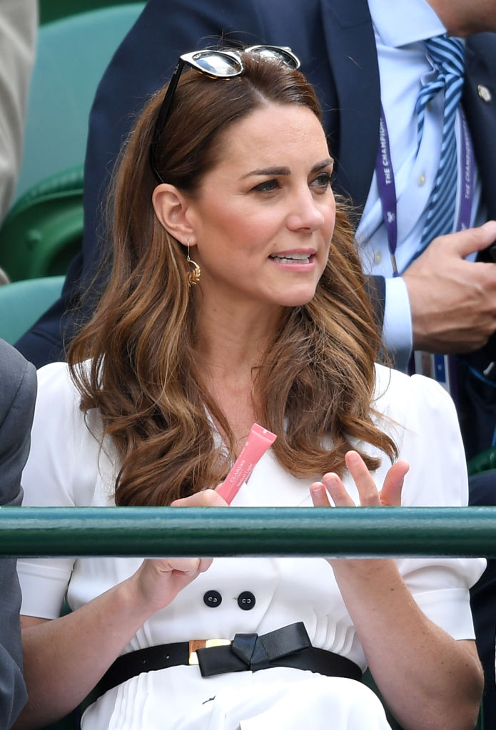 Kate Middleton holding Clariin's lipstick