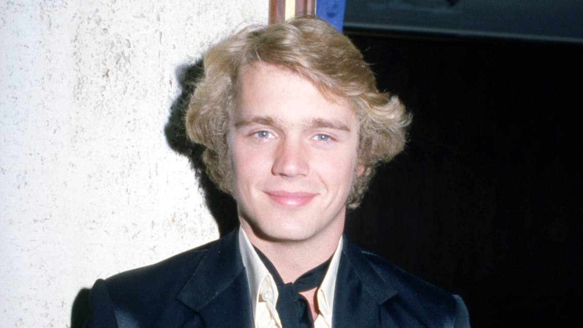 young man smiling; john schneider young
