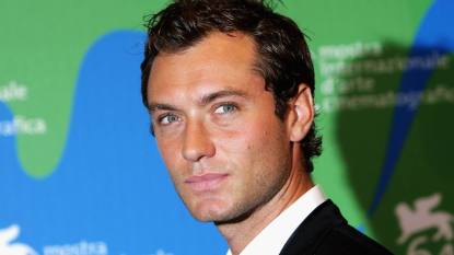 young man smiling; jude law young