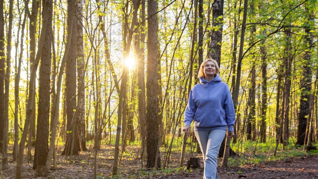 woman walking in forest