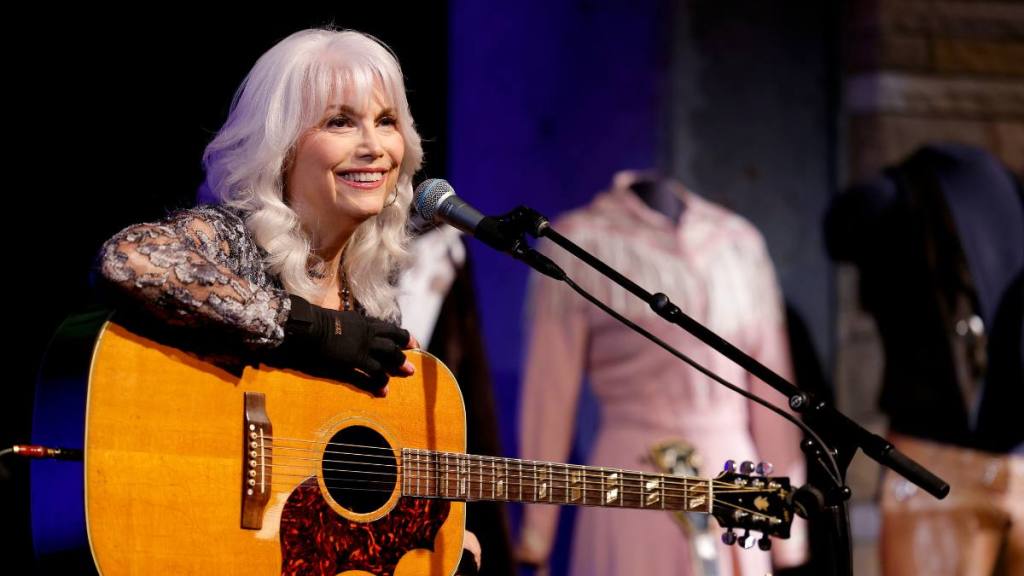 woman singing; emmylou harris greatest hits