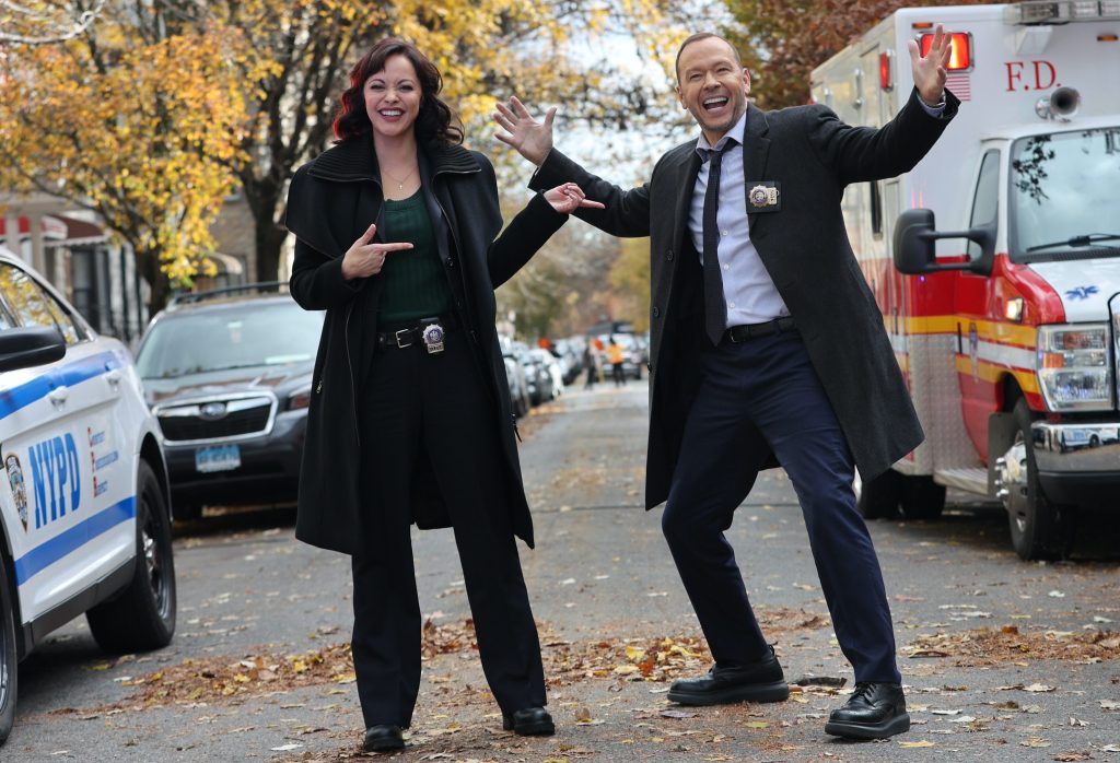 man and woman having fun on the street