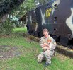 Sgt. Colin Bettner with Cindy, the pup he adopted