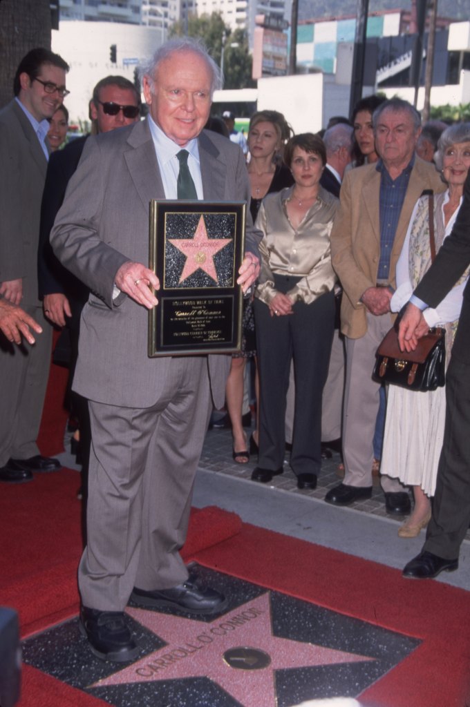 March 17, 2000: Carroll O'Conno holding a plaque during a dedication for his star on the Hollywood Walk of Fame. 