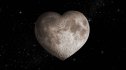 Heart-shaped moon in space