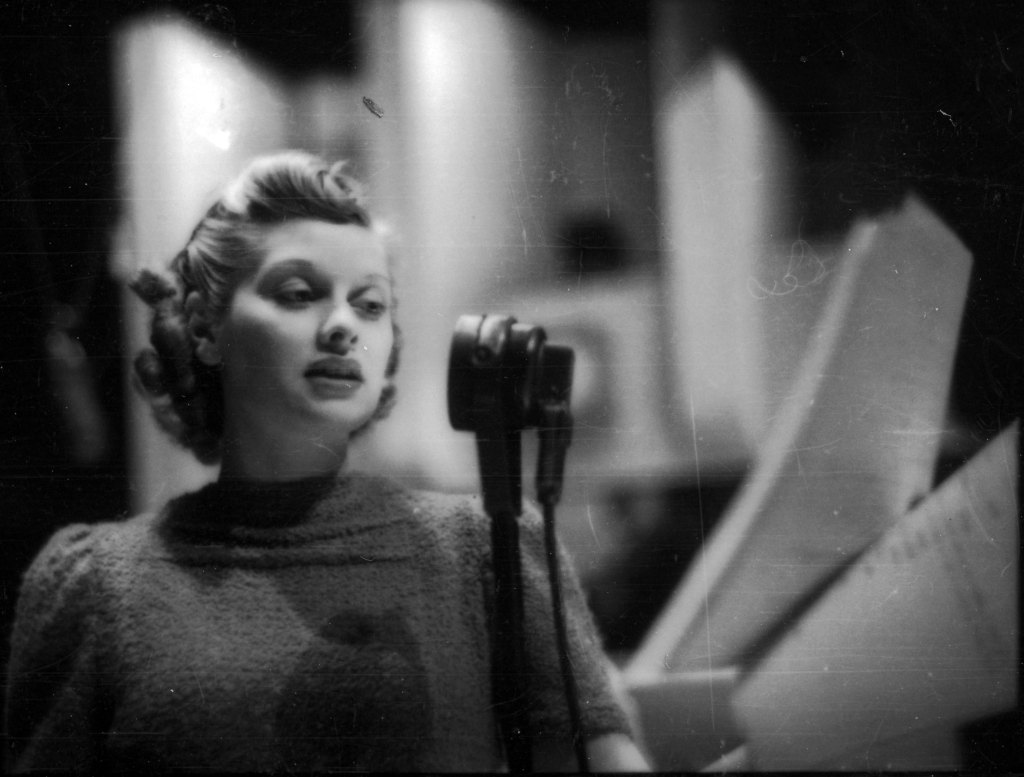 Lucille Ball appears on radio program 'The Phil Baker Show', 1938.