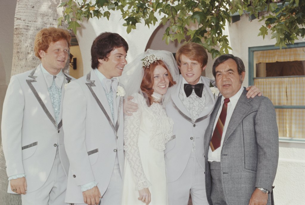 Ron Howard marries Cheryl Alley at the Magnolia Park United Methodist Church in Burbank, California, 7th June 1975. From left to right, 'Happy Days' co-stars Don Most and Anson Williams, the bride and groom, and co-star Tom Bosley.