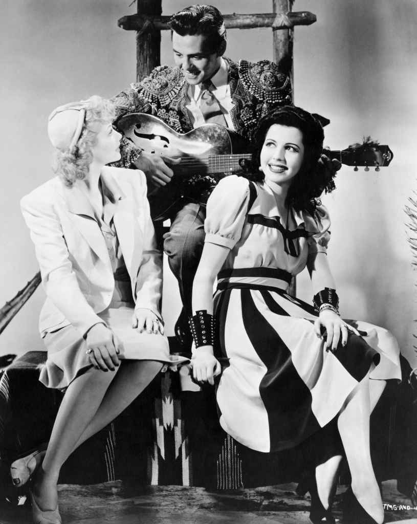 Lucille Ball (left) met Desi Arnaz (center) when they both appeared in RKO's 1940 film version of the Broadway hit, Too Many Girls in which Desi had appeared on Broadway. At right: Ann Miller. (Actually Lucille and Desi were not a romantic team in the film; Lucille's romantic partner in this film was Richard Carlson).