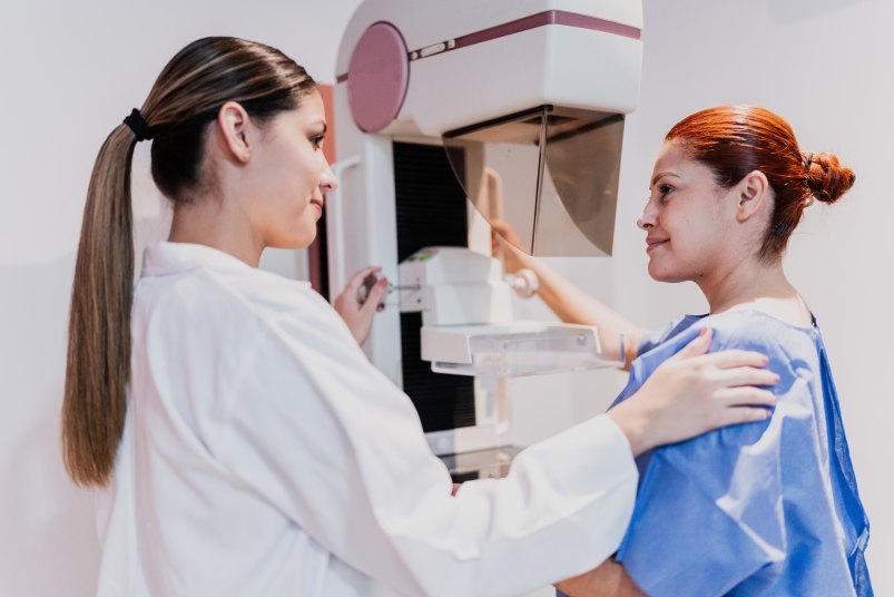 mature woman getting a mammogram to check for dense breast tissue