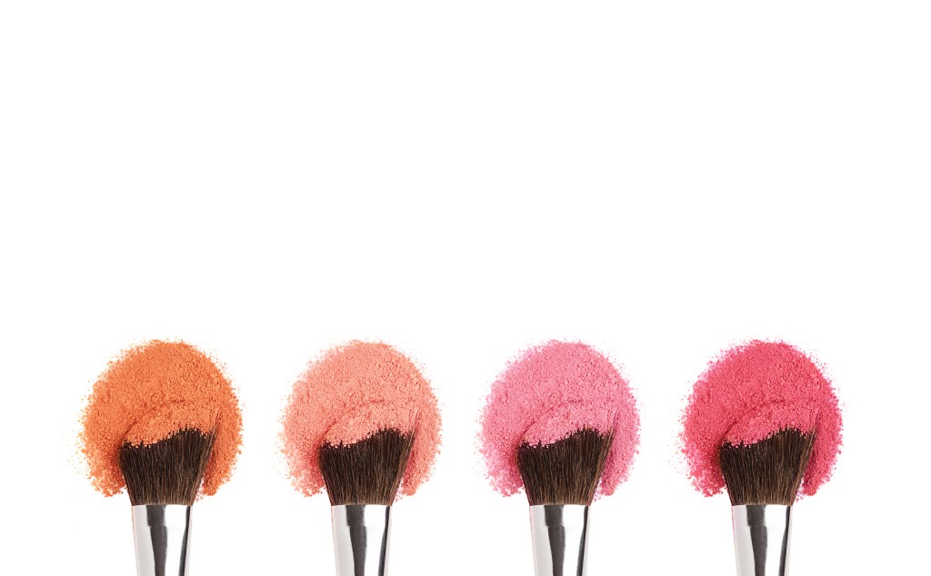 Sunset blush makeup colors on makeup brushes