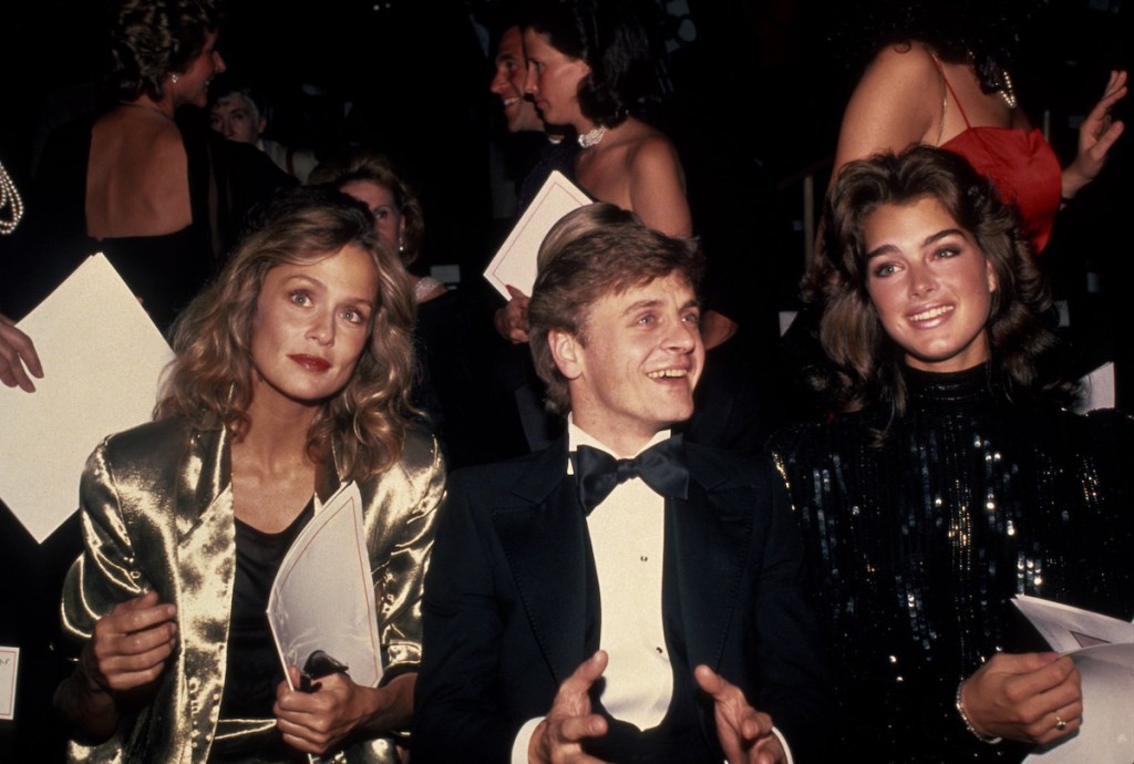 The model, Mikhail Baryshnikov and Brooke Shields attend the Valentino fashion show circa 1982 in New York City