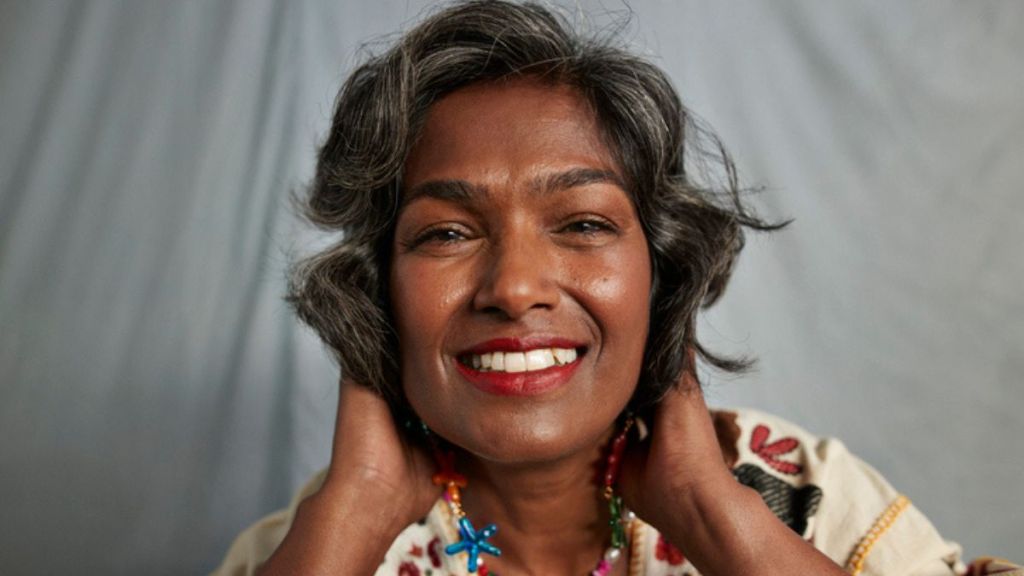 mature woman with hair regrowth after doing scalp massages