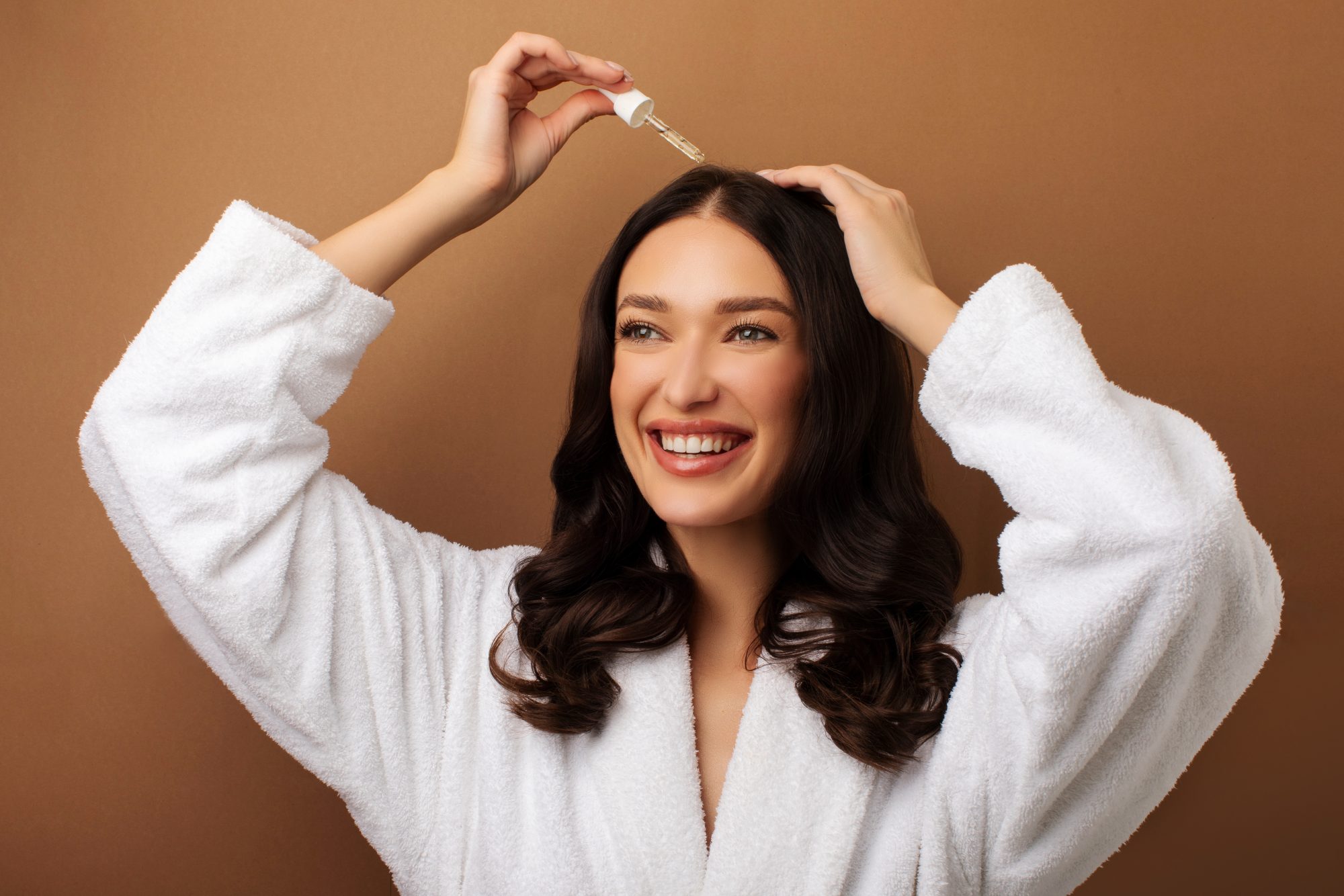 GettyImages-2261123962-Serums-Are-No-Longer-Just-for-Your-Face-New-Formulas-Promise-to-Repair-Your-Scalp-and-Tooth-Enamel
