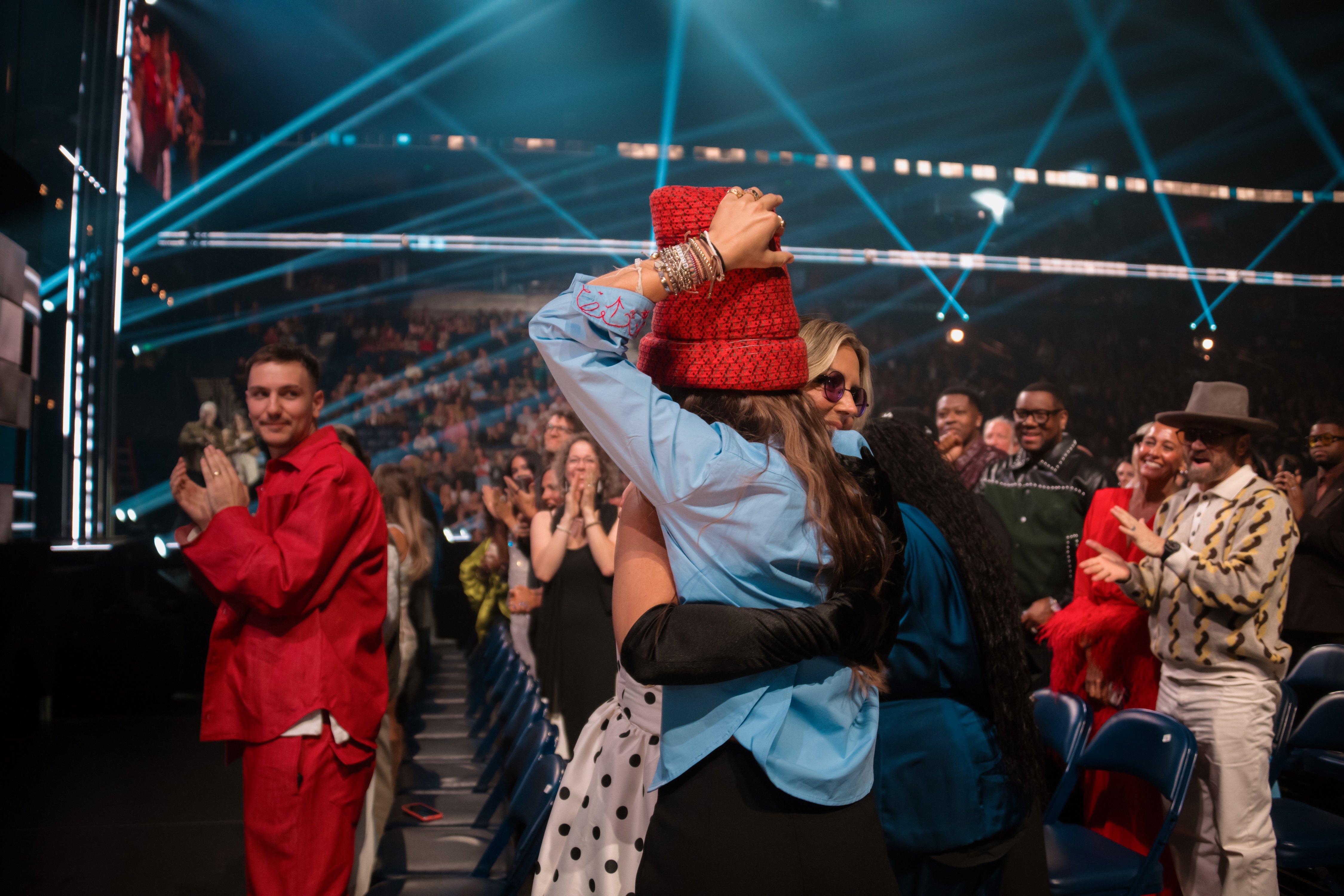 Jamie MacDonald hugs Lauren Daigle after winning New Artist of the Year