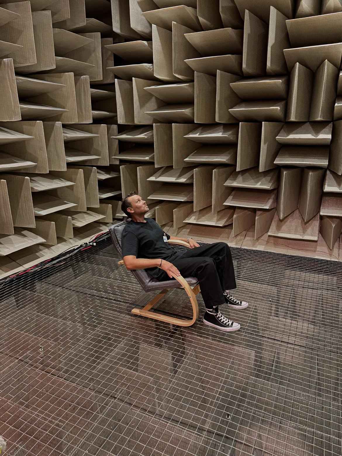 While doing research for Into the Quiet, John Mark visited the quietest place on earth/ an anechoic chamber at Microsoft at -20 decibels