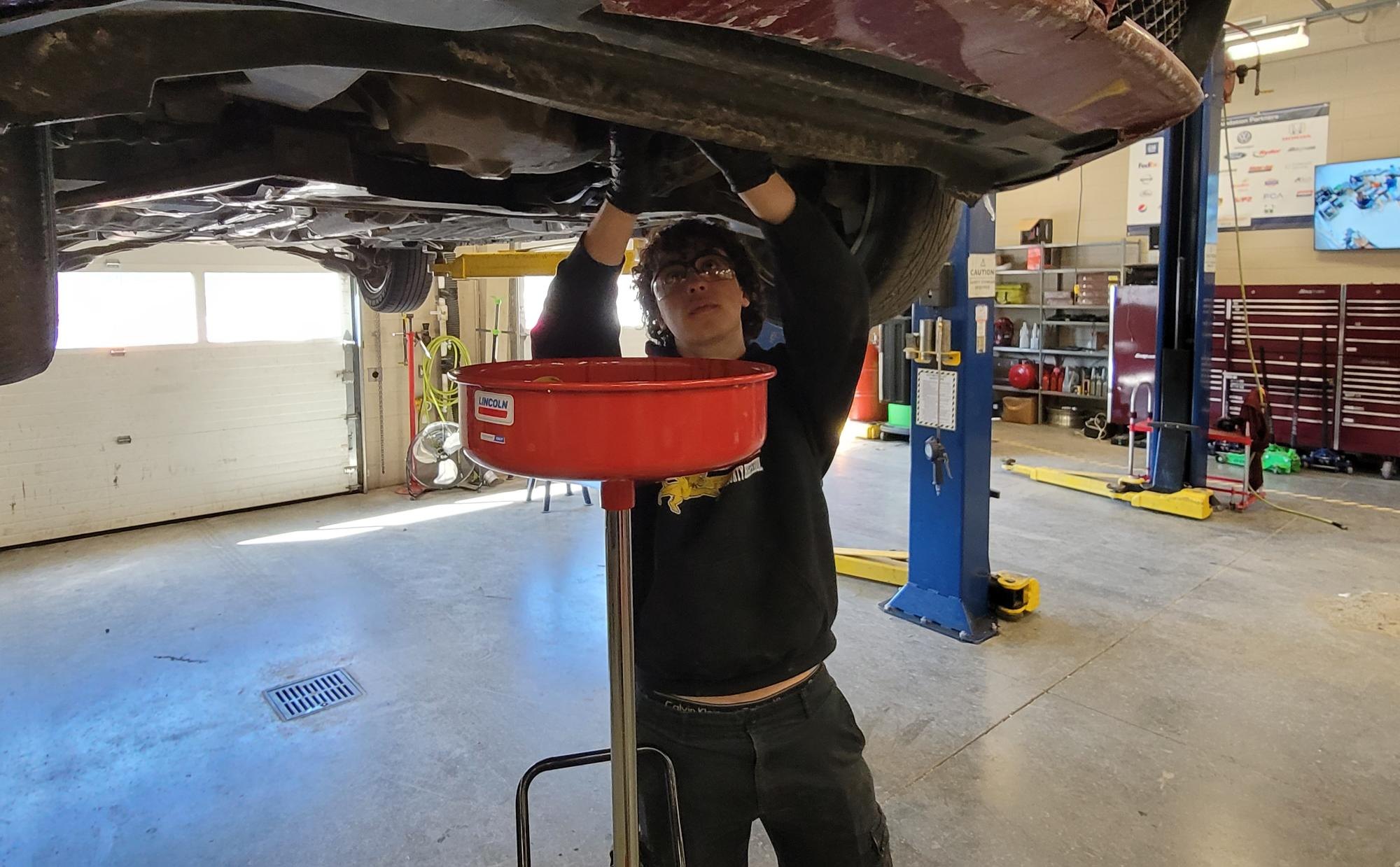 Students at Louisa County High learn skills in an auto tech class